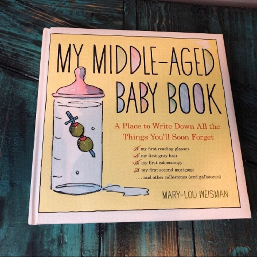 𝅺BRAND New Middle Aged Baby Book.